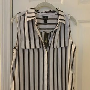 Black and white button down sleeveless blouse